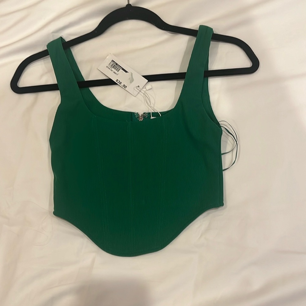 Green corset top.